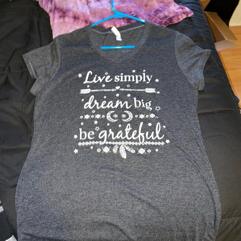 EJEL Size 2x fits like a Medium in womens.